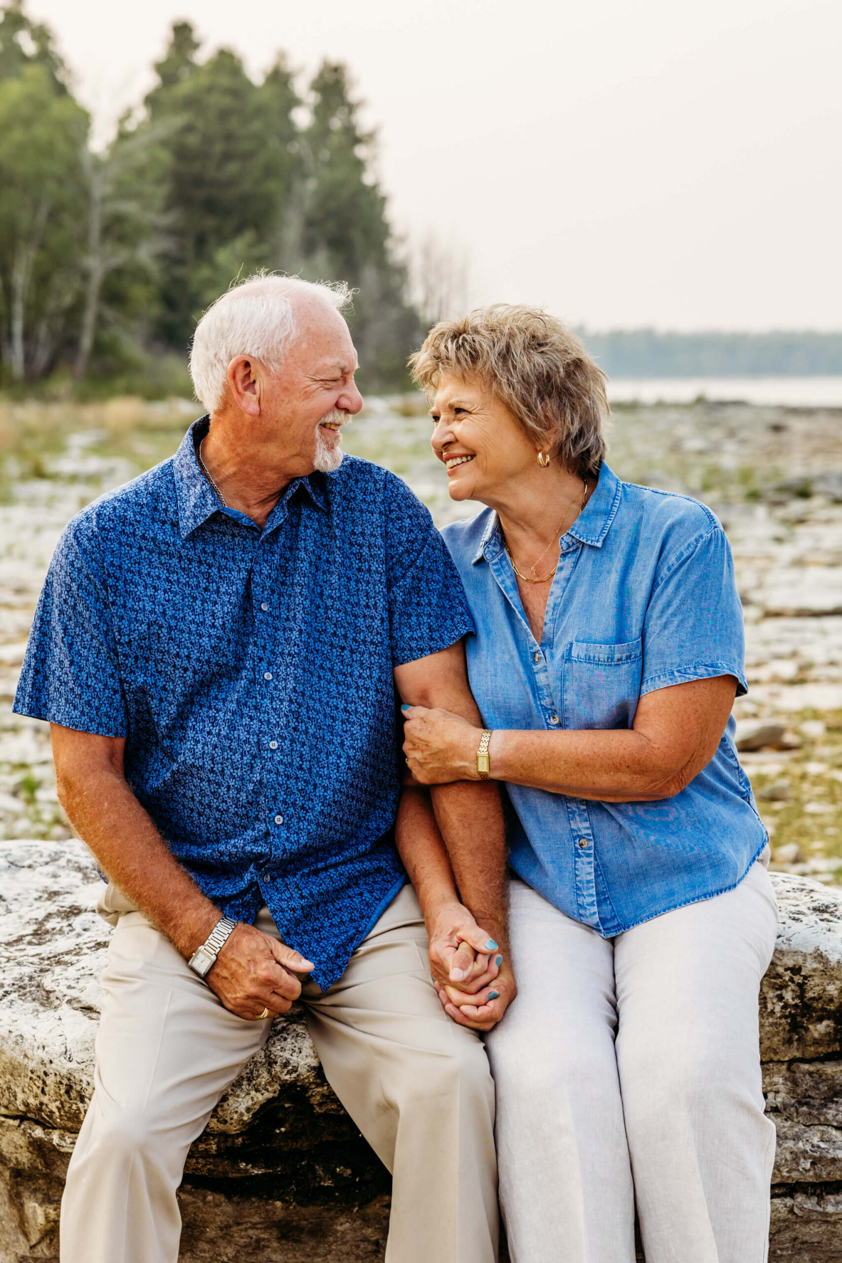 Adorable older couple laughing as they snuggle together for a blog post about Seaquist Orchards Farm Market