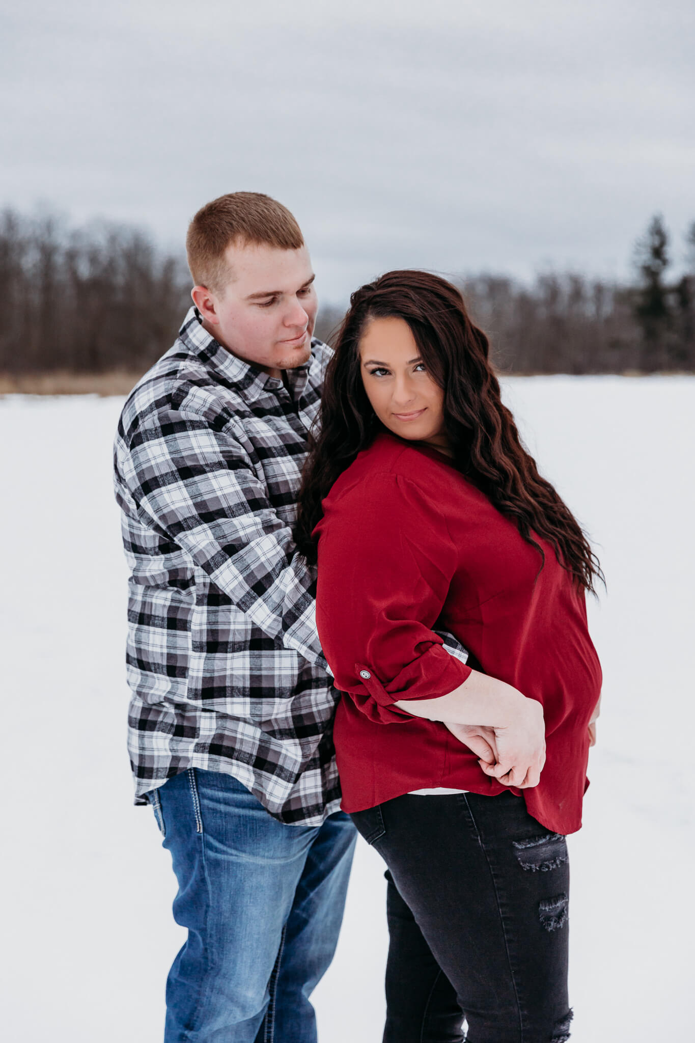 Gorgeous couple posing during their engagement session in appleton by Ashley Kalbus Photography